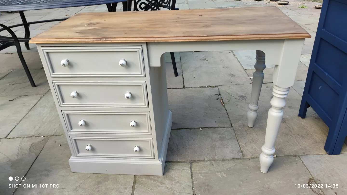 Pale painted desk with drawers and a natural wood top
