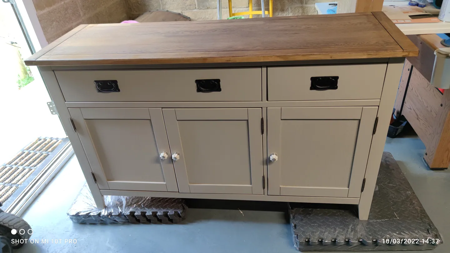 Pale painted sideboard with a timber top