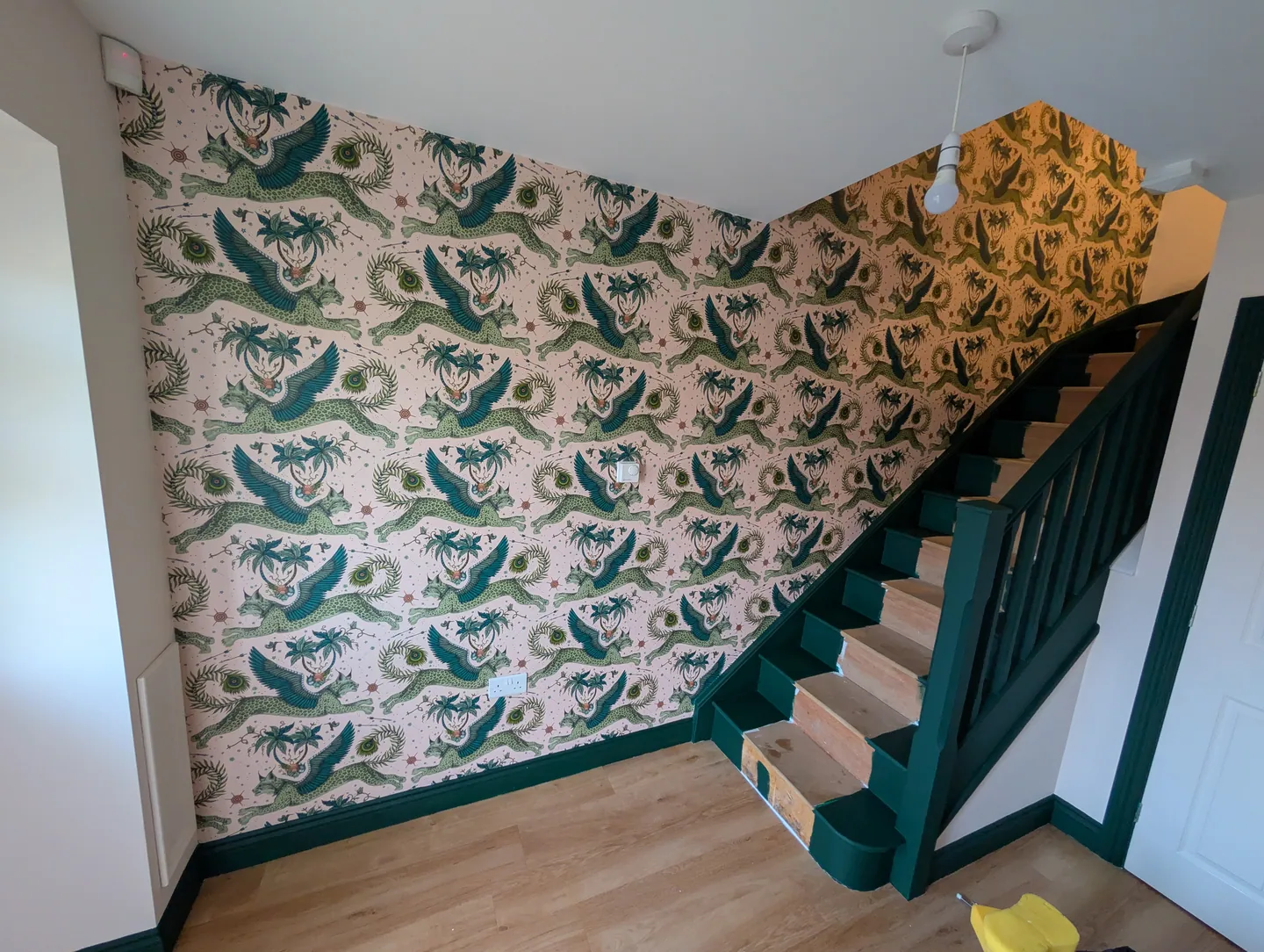 Staircase decorating in progress before the stair covering is fitted